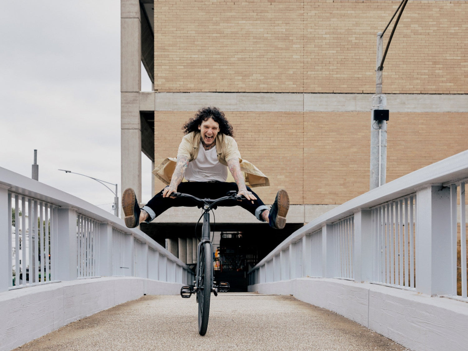 Man doing tricks on Amsterdam plus electric bike